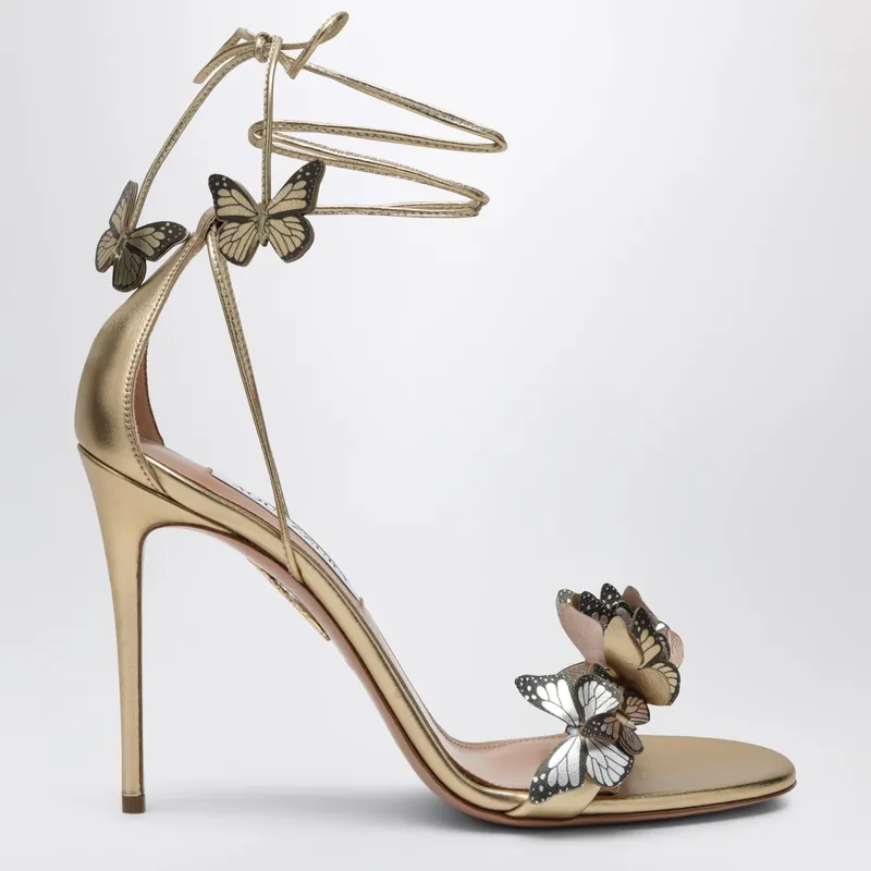 Papillon 105 Metallic Leather Sandals In Soft Gold - Aquazzura