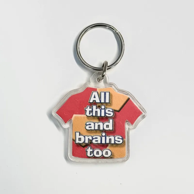 Novelty T-Shirt Acrylic Keychain ‘All this and brains too’ Key Ring, Pre-Owned