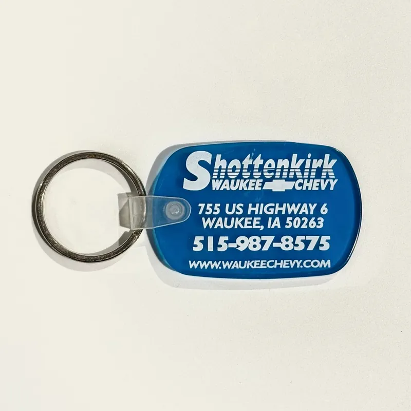 ‘Shottenkirk Waukee (IA) Chevy’ Keychain Key Ring Blue Rubber Oval - Unmarked
