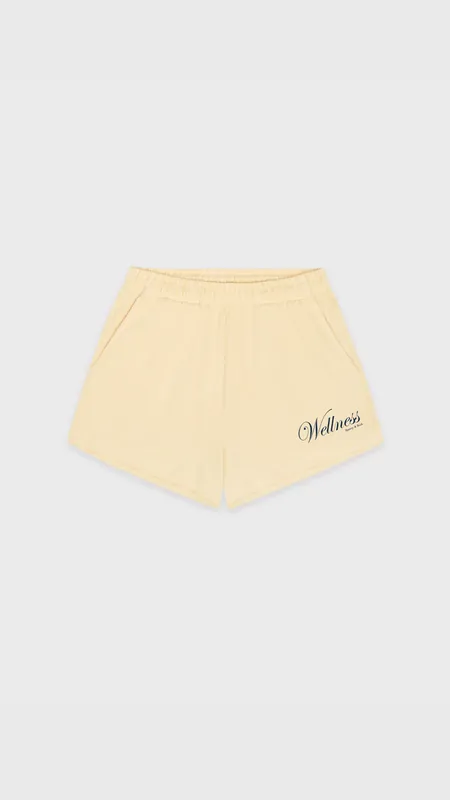 Sporty & Rich Avenue Disco Short in Almond/Navy