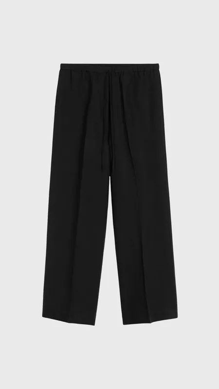 Toteme Fluid Drawstring Trousers in Black