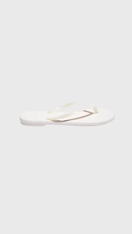 Tkees Aqua Lily Flip Flops in Coconut