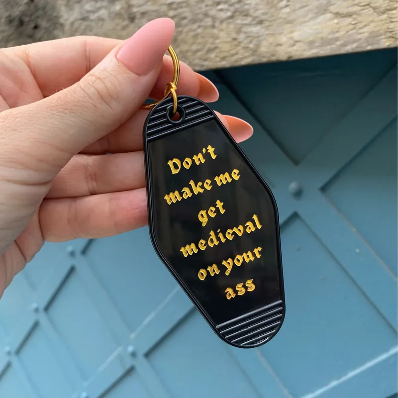 Don't Make Me Get Medieval on Your Ass Motel Style Keychain - The Bullish Store